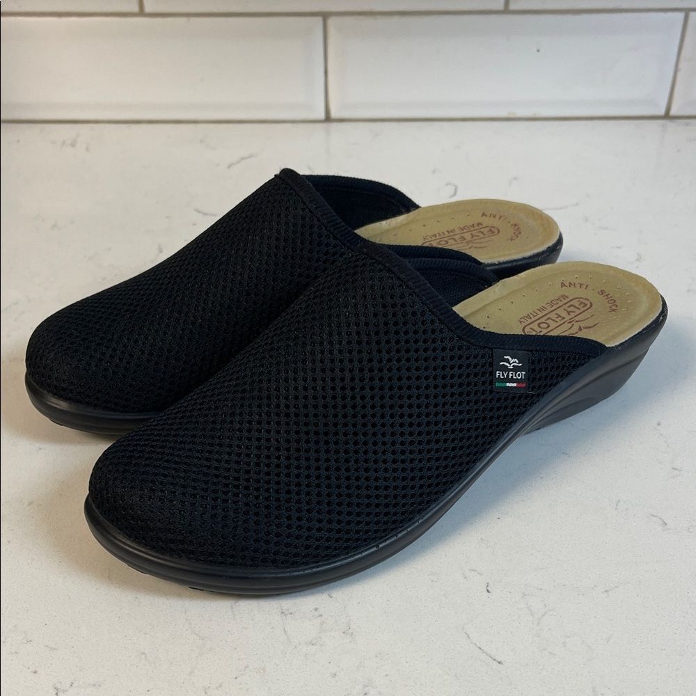 Fly Flot Womens Open-back Slippers
Women's Black Slip-On Shoes Euro 40 - US 9